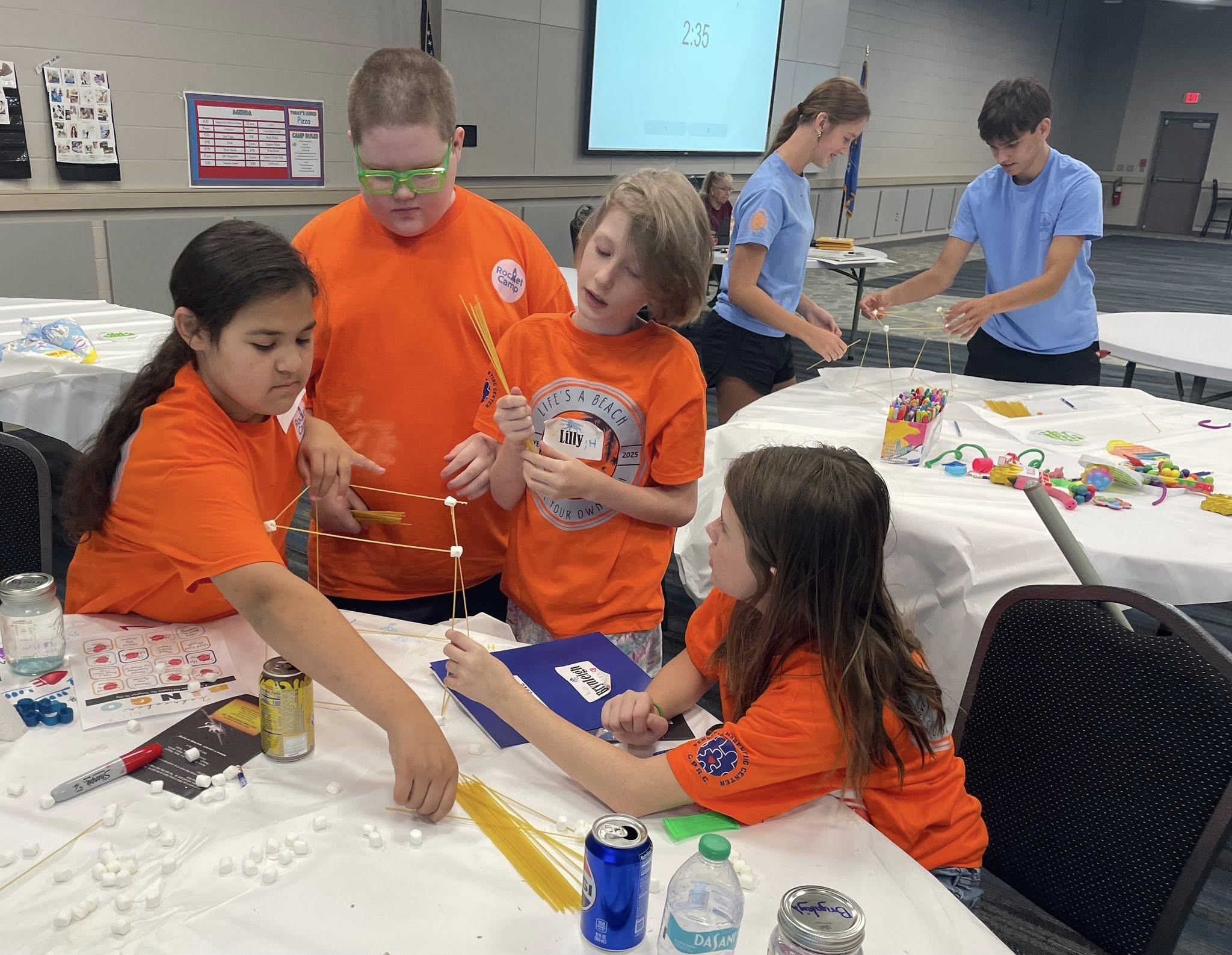 A group of students participating in a camp activity.