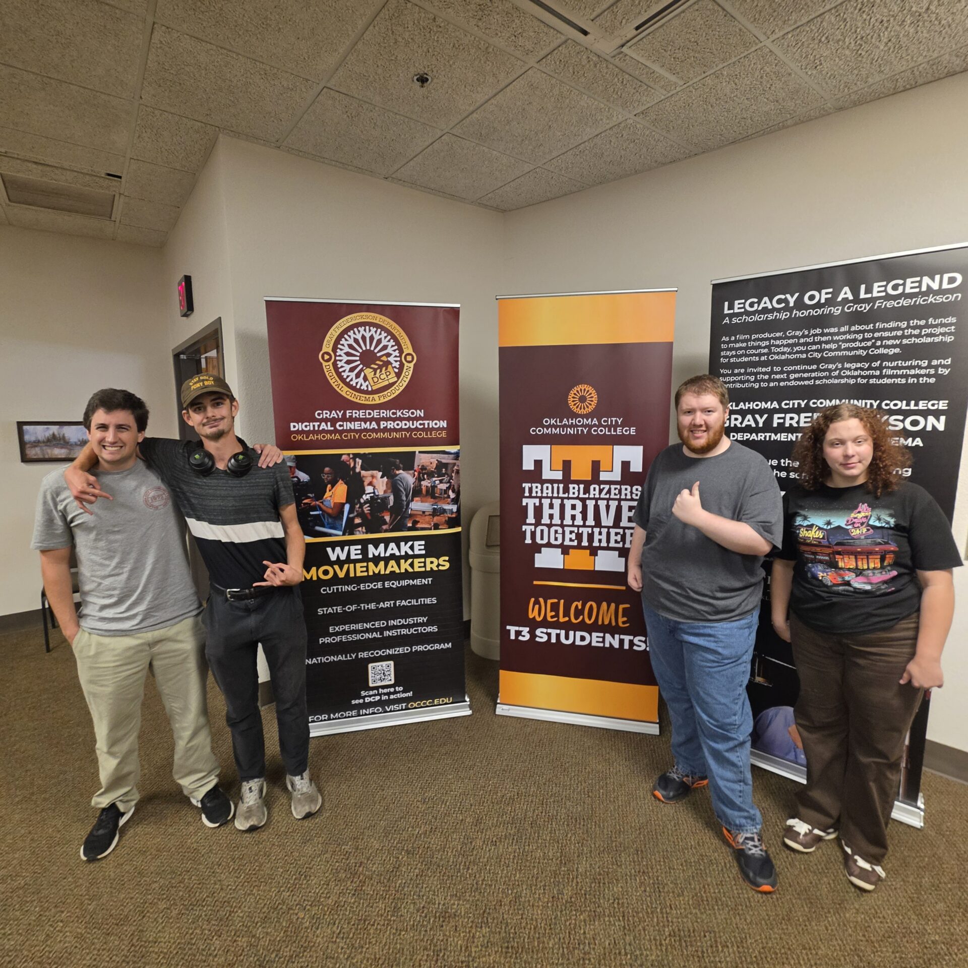 The first four students of the Trailblazers Thrive Together program standing in the hall of Oklahoma City Community College